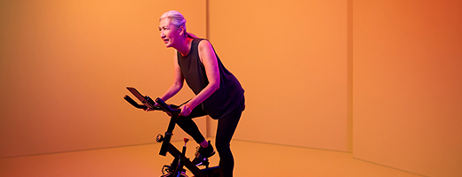Image of a senior woman on an exercise machine